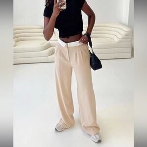 Tan fold over waist slacks